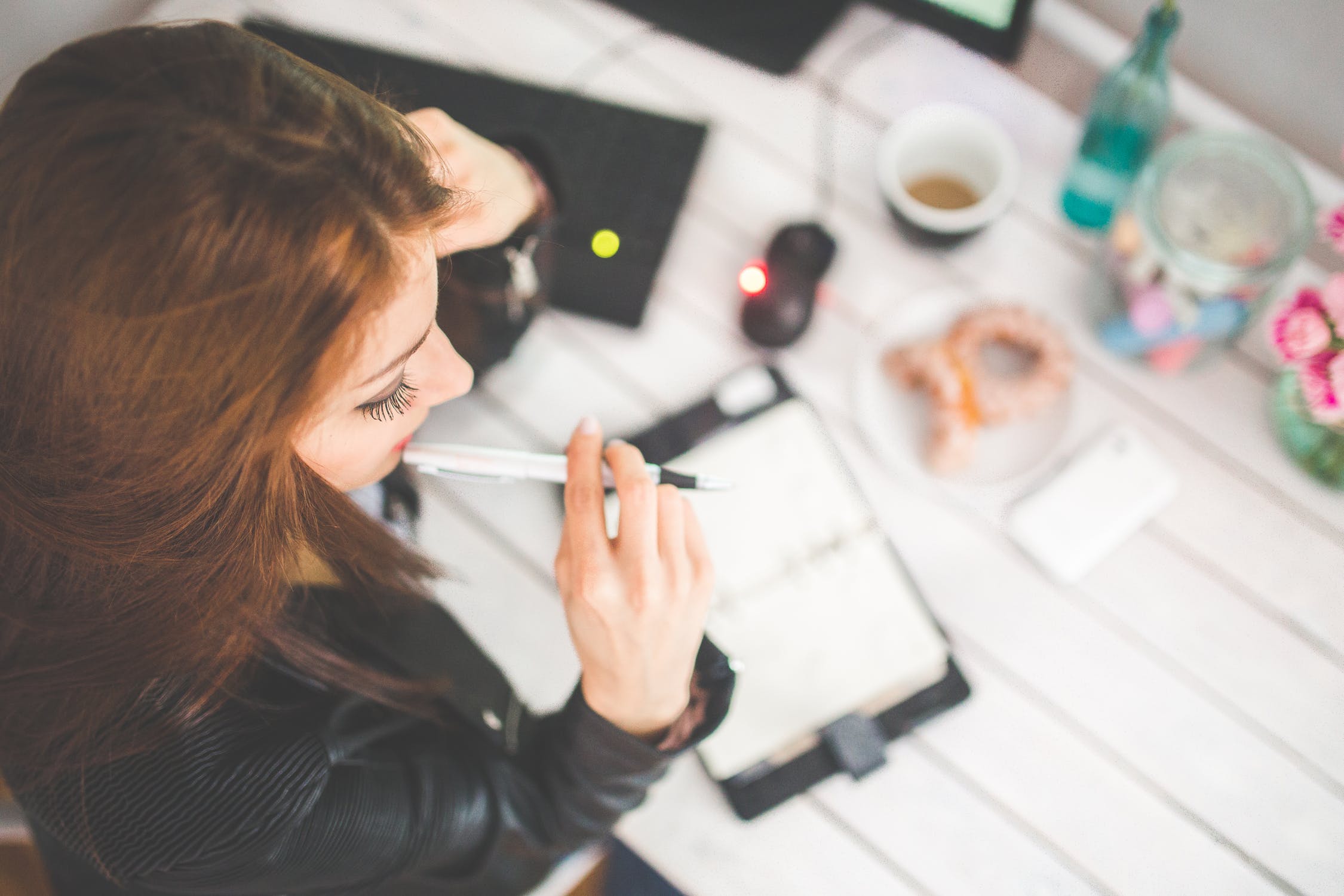 Stock photo girl holding pen